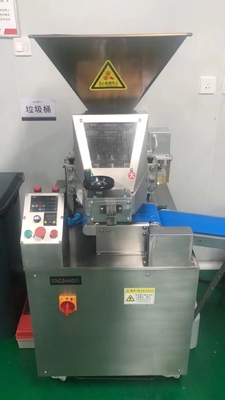 Eficiencia Máquina automática de redondeo de masa de cono 8000pcs/hora con 0.4KW de potencia