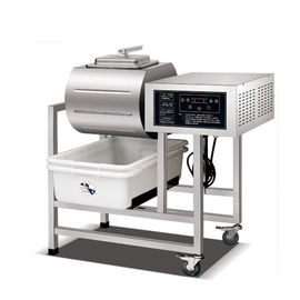 La cocina de Marinator del pollo que cocina la carne del equipo que sala la máquina gira el vaso